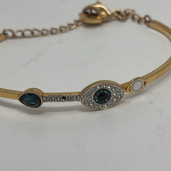 Bracelet with golden water eye with blue and white stone - Picture 4 of 5